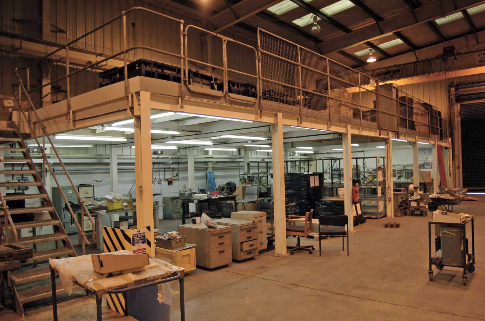 An Approx. 18M x 6M Bolted Steel Mezzanine Floor with Two Steel Access Staircases, Safety Hand