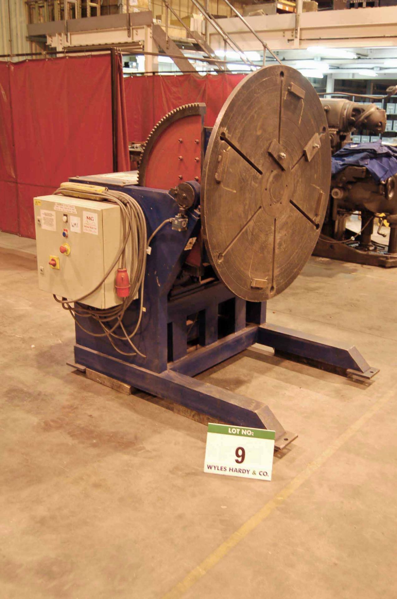 An Electromechanical Gear Tilt Rotary Welding Positioner with 1200mm dia. Slotted Table (415V)