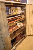 A Steel 2 Door Steel Cabinet with 2 MIG Welding Drums and a Quantity of Welding Rods (As