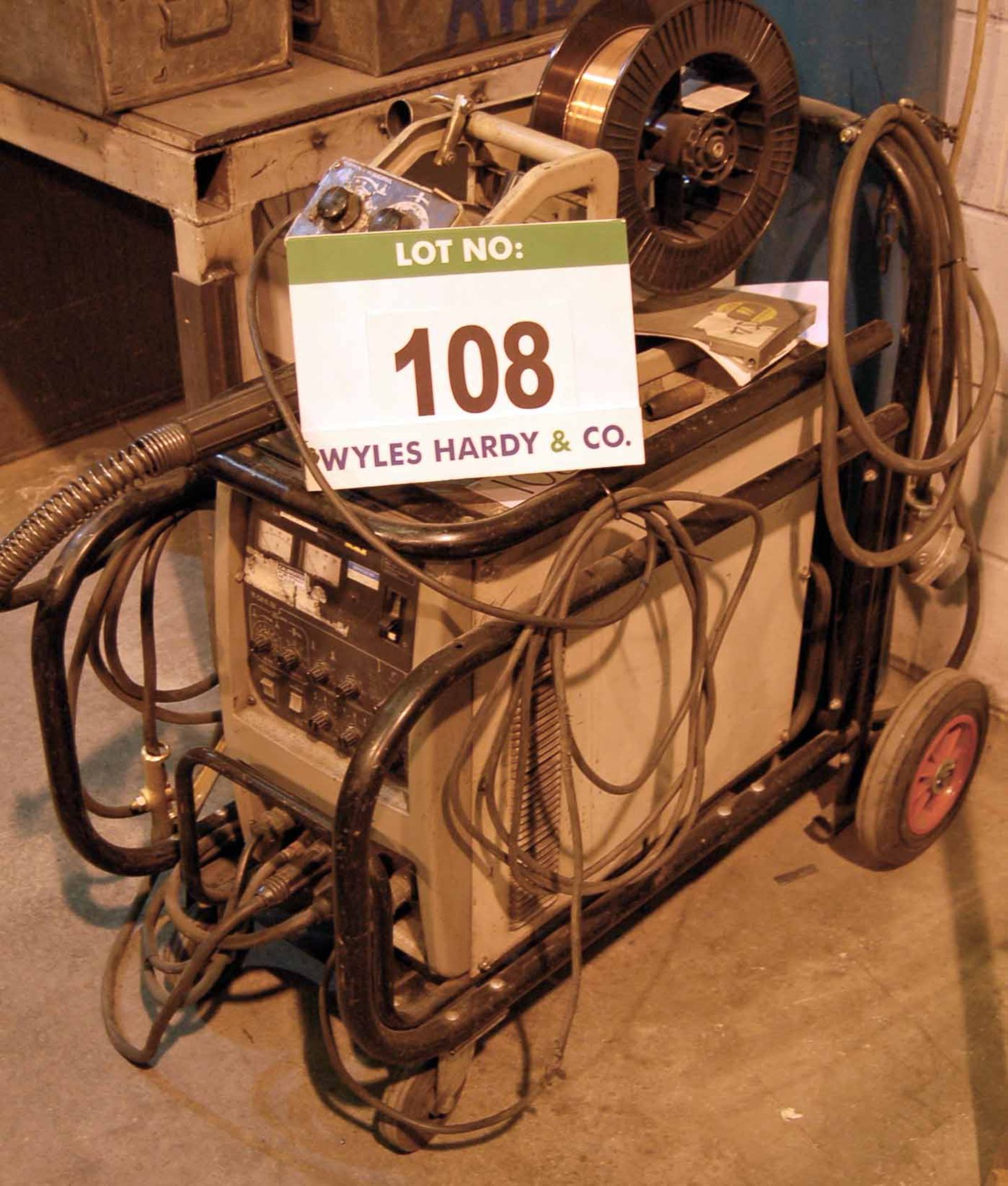 A HITACHI 3500A-DT Mig Welding Power Transformer with A HITACHI TM 351E Wire Feed Unit mounted on