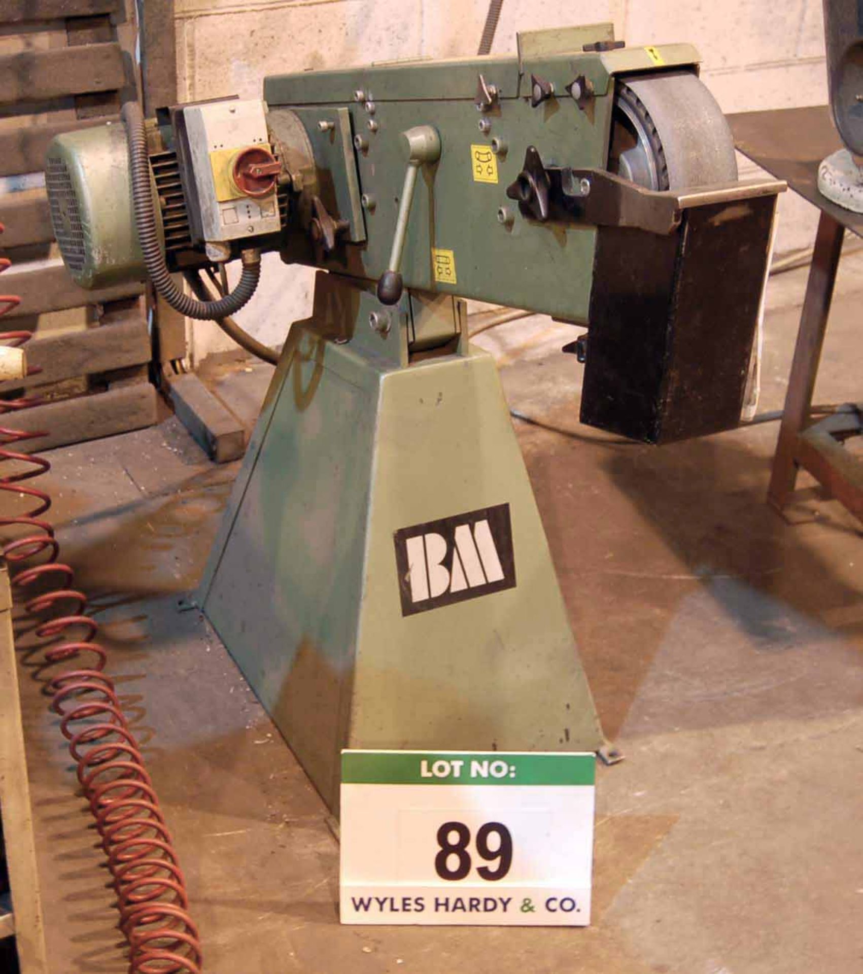 A BM 75mm Horizontal Pedestal mounted Belt Linisher