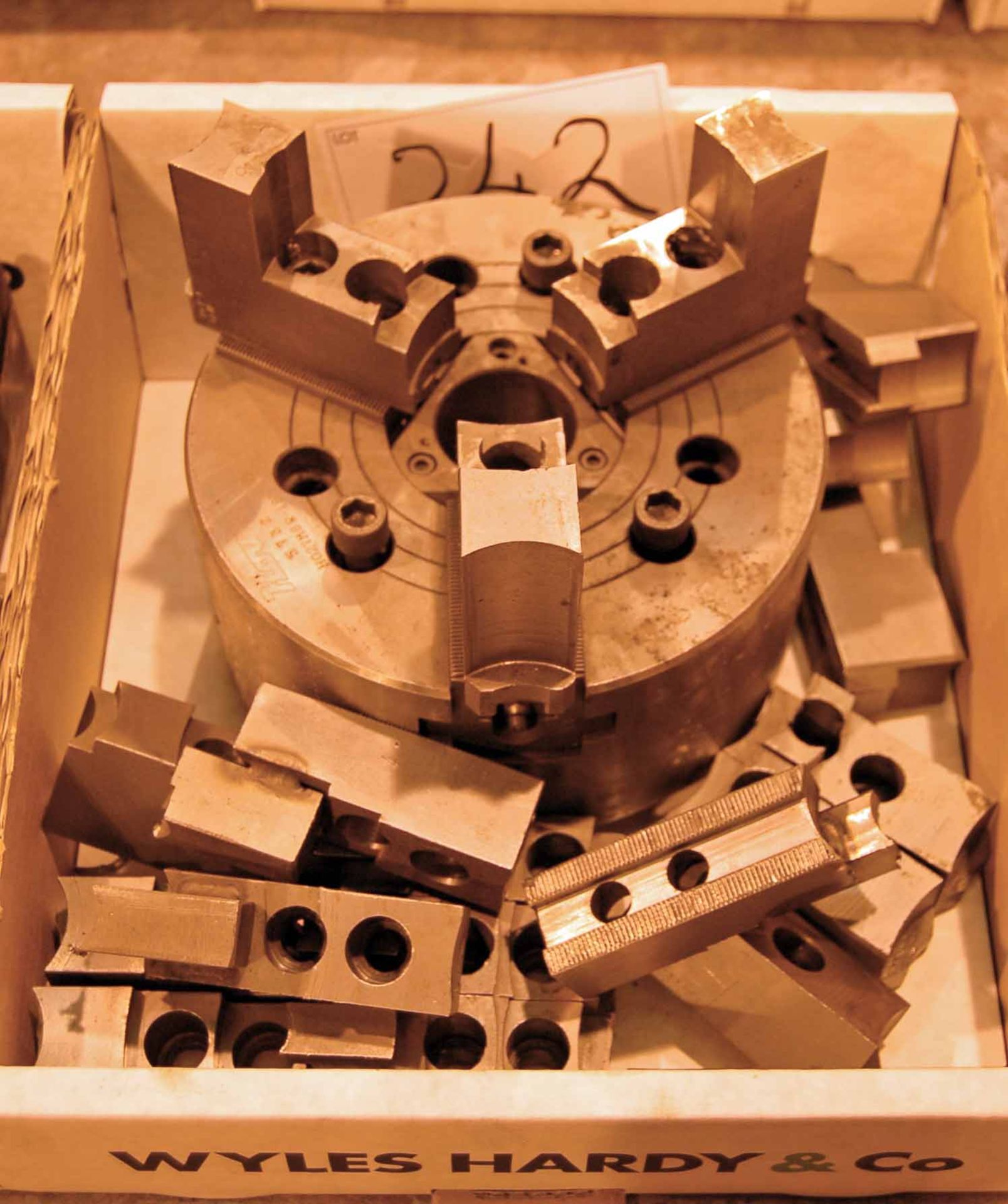 An 8 Inch 3 Jaw Chuck Vice and Various Jaws (As Photographed)