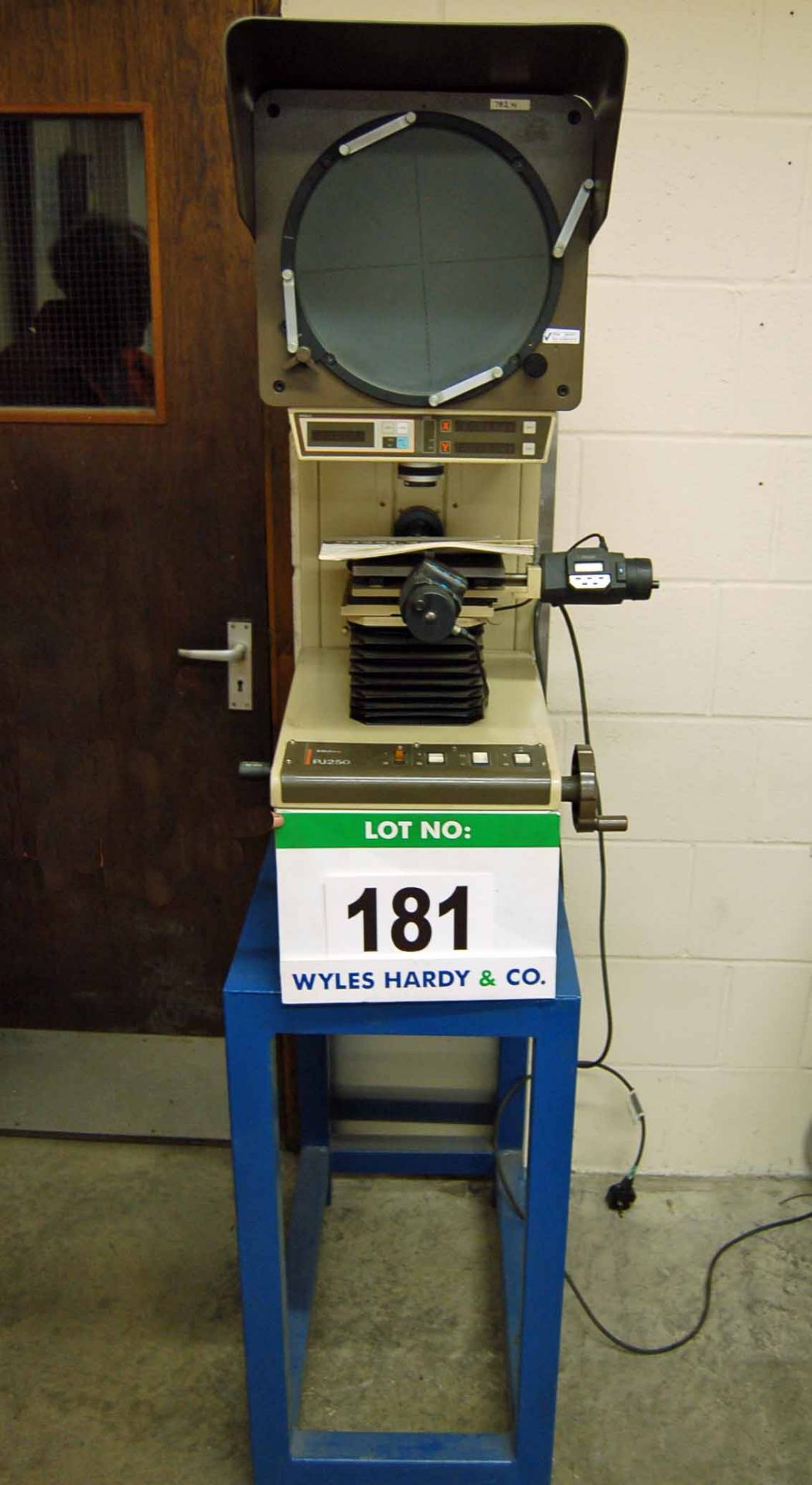 A MTUTOYO PJ250 Shadowgraph Profile Projection Machine with Aftermarket Digital Read Out on