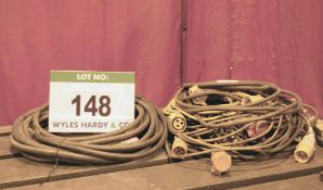 A Quantity of Extension Leads (110v) and Two Air Hose Extension Pipes