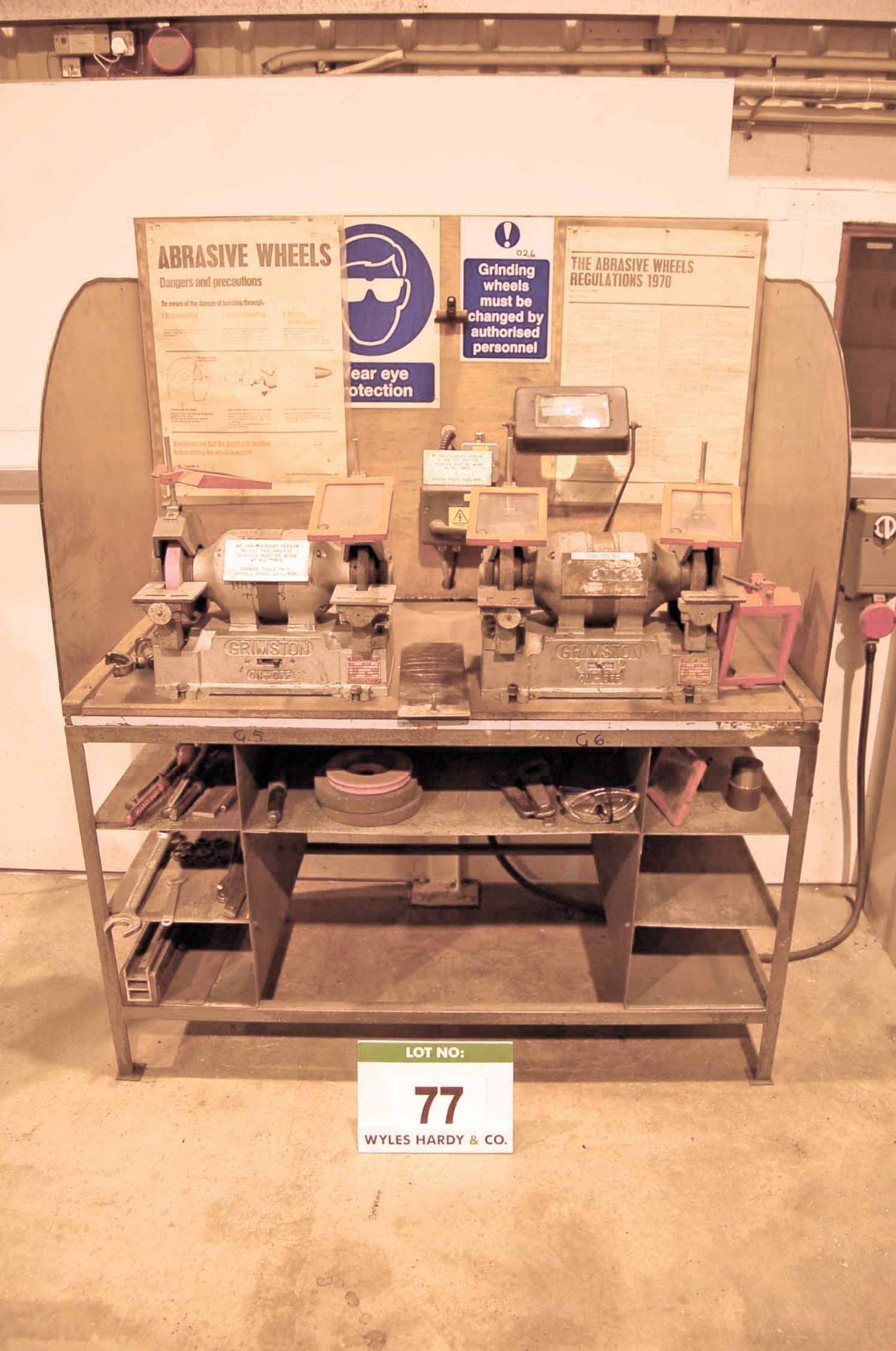 A Grinding Bench with Two GRIMSTON BGS8B 8x1 Double Ended Bench mounted Grinders, Serial Nos.