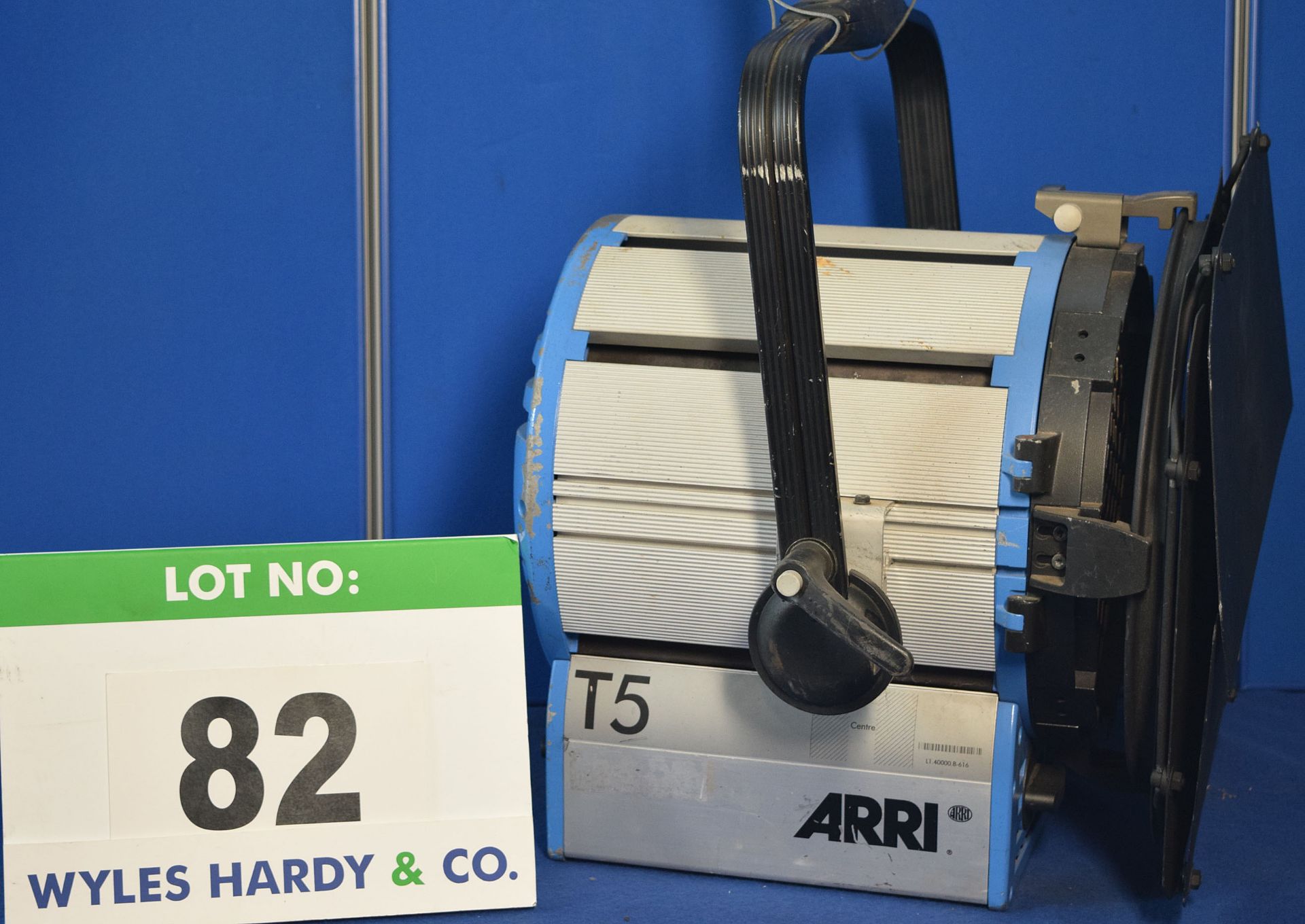 An ARRI T5 5000W Light with fitted Barn Doors and Stirrup Mount