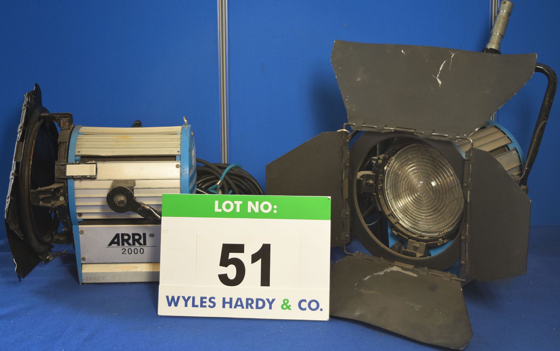 Two ARRI 2000 2000W Lights each with fitted Barn Doors and Stirrup Mounts