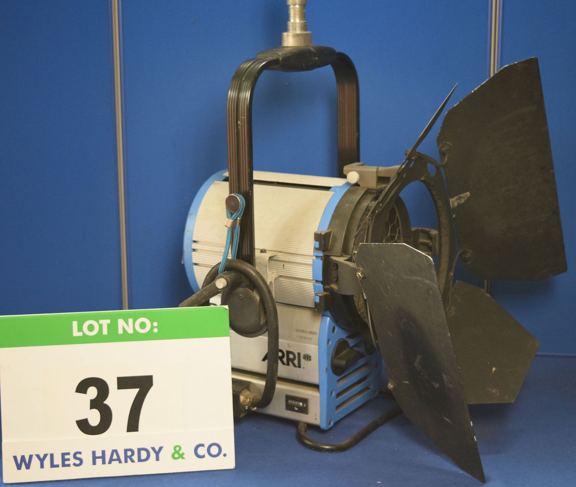 An ARRI D12 1200W Light with fitted Barn Doors and Stirrup Mount. Recorded Hours: 940 hours