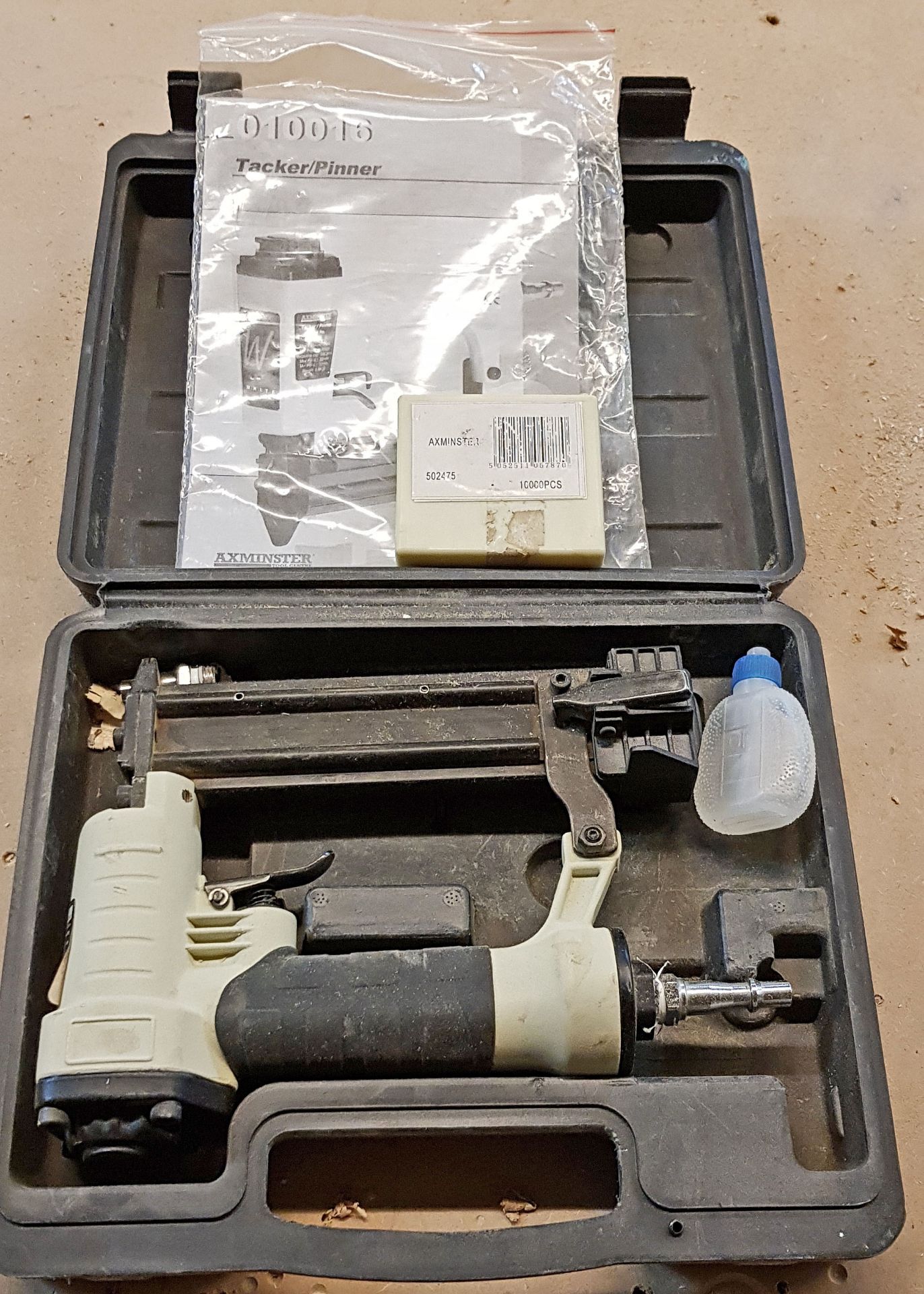 An AXMINSTER 010016 Pneumatic Tacker/Pinner in Plastic Carry Case