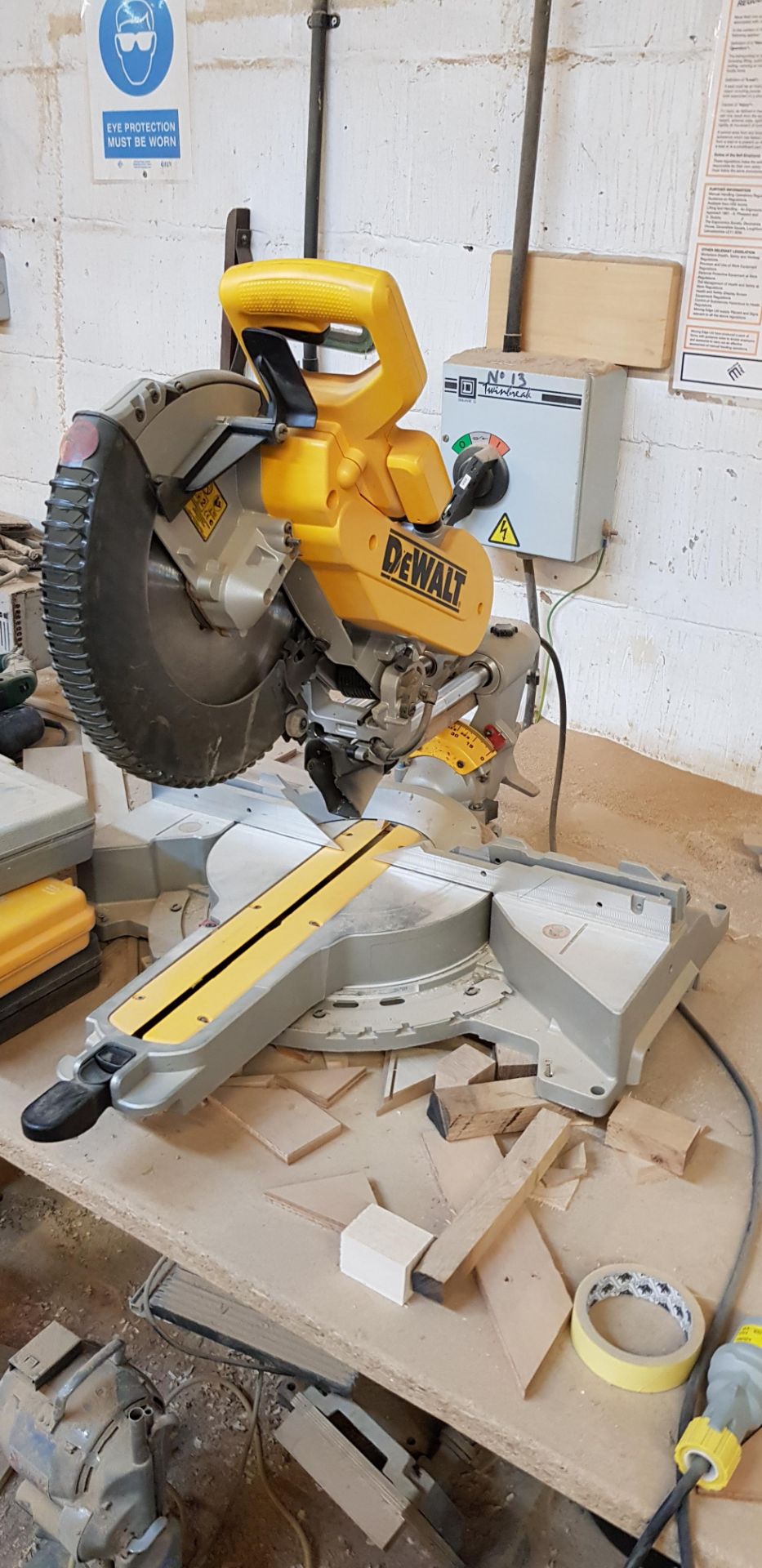 A DE WALT DW5780 Pull-Down Circular Mitring Saw on Benchtop Stand (110V)