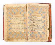 KORAN, handschriftlich, mit schönen Randverzierungen und mehreren goldverzierten Prunkseiten, 23 x