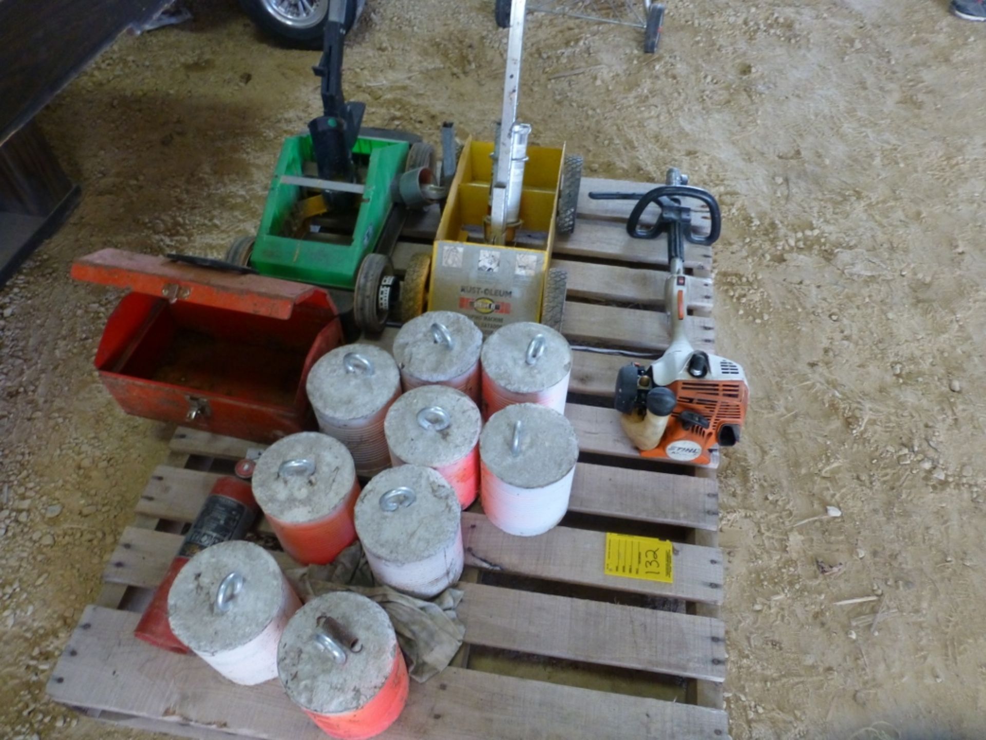 Pallet with paint stripers, tool box, Stihl part