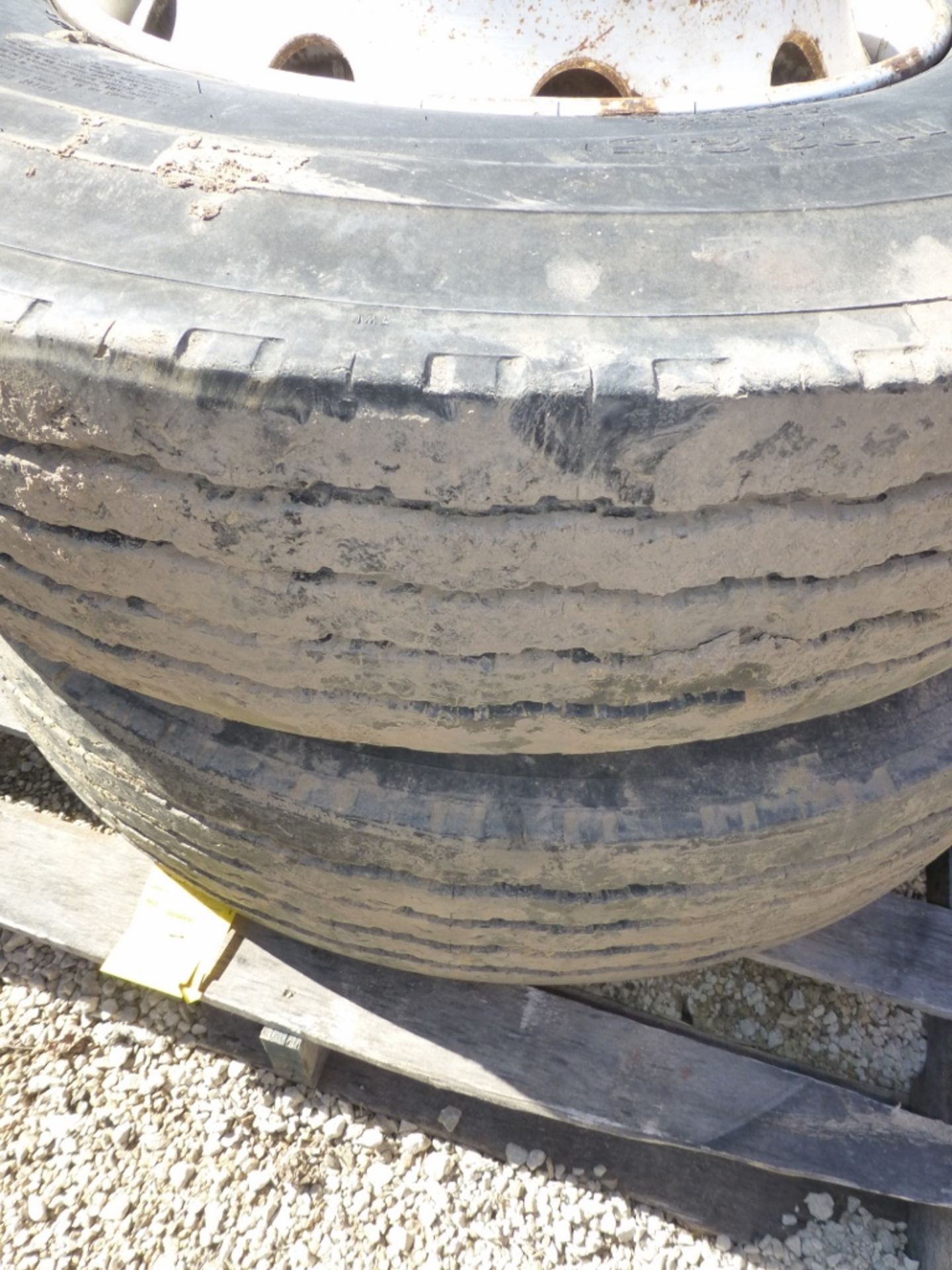 (2) 11R22.5 tires/rims