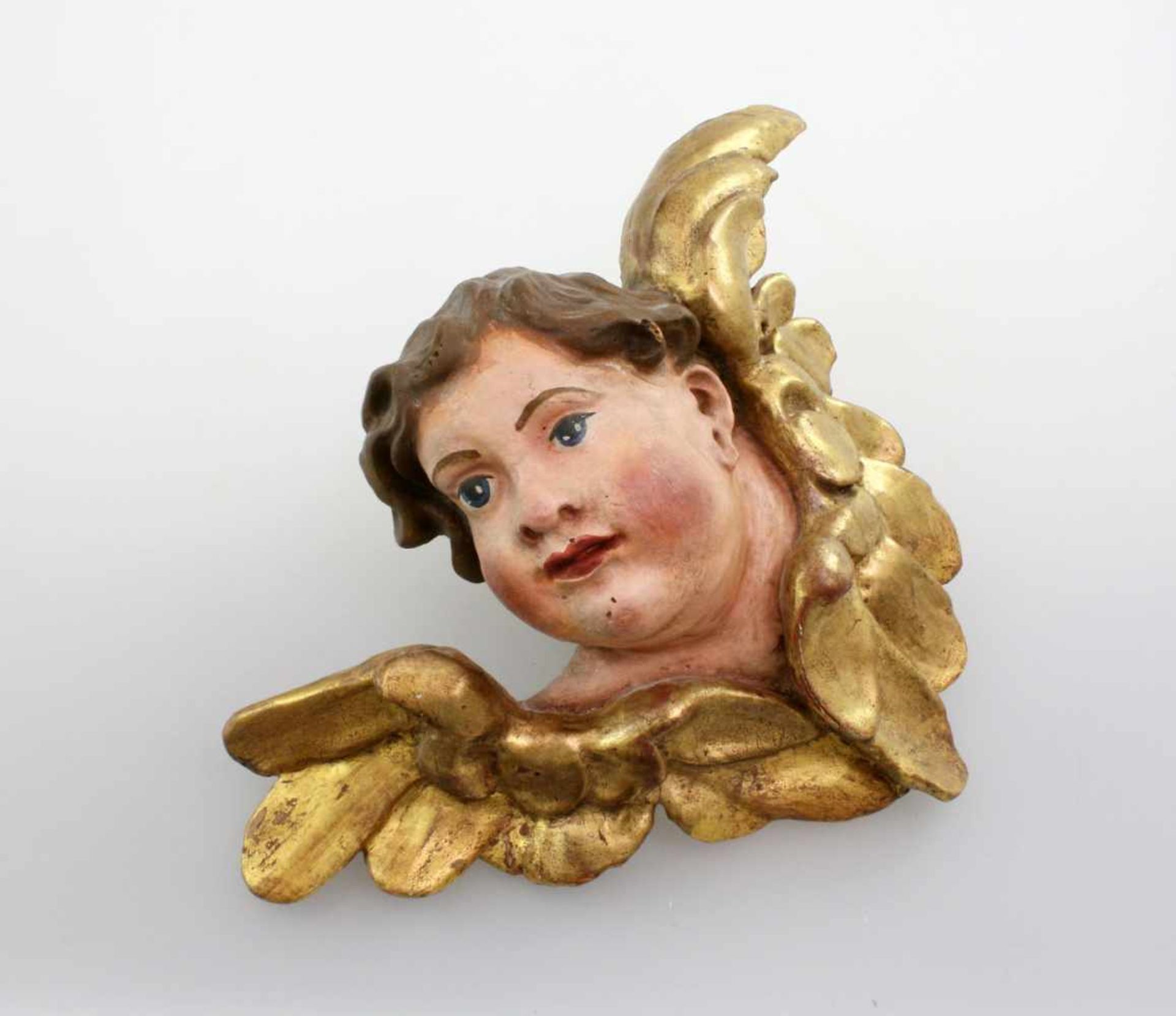 Holzfigur - Putte - 18. Jahrhundert Polychrom- und goldstaffierte Figur, Spuren von früherem