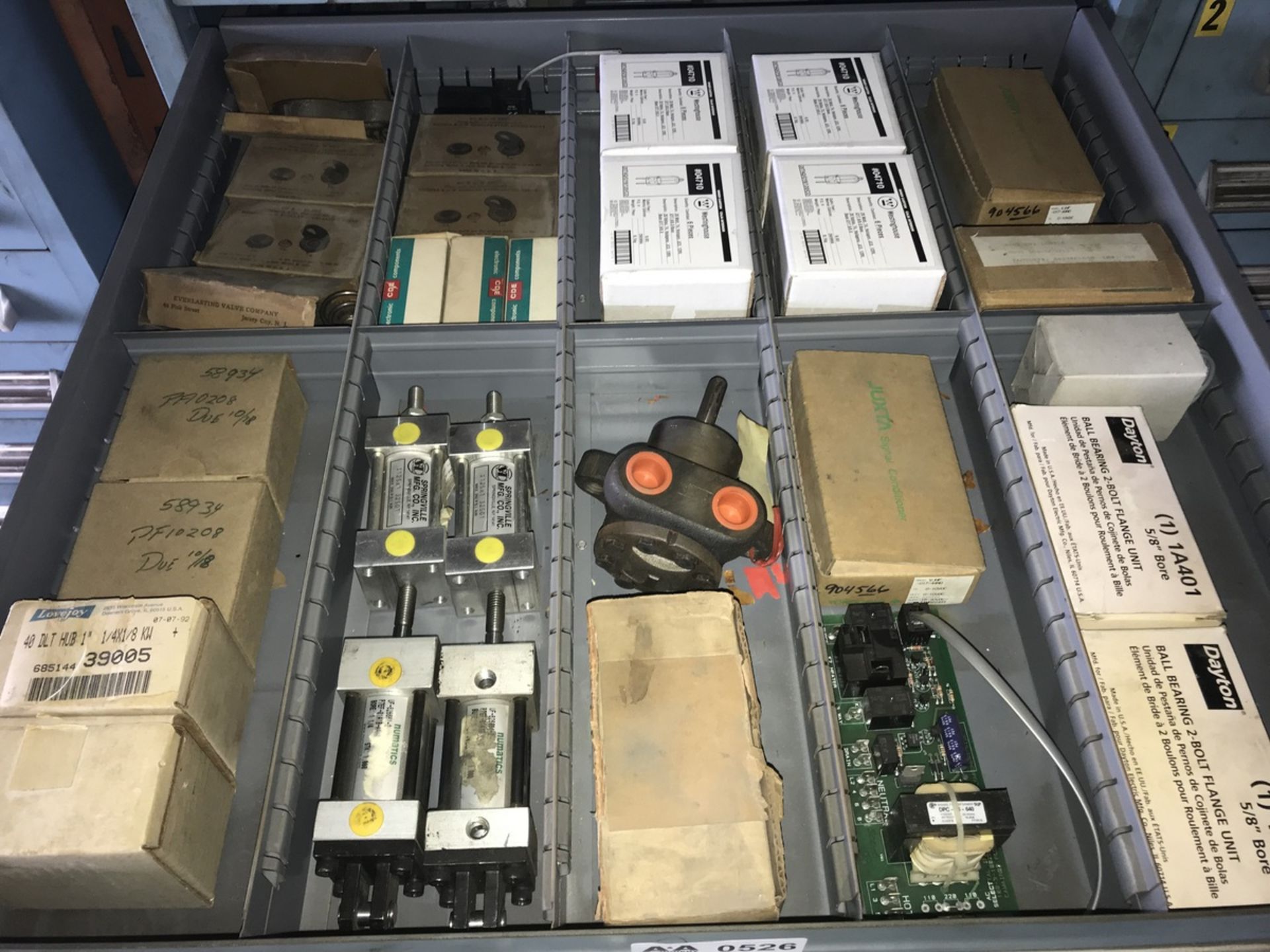 Contents of Drawer including Dayton bearings, pneumatic cylinders, lovejoy couplings, everlasting