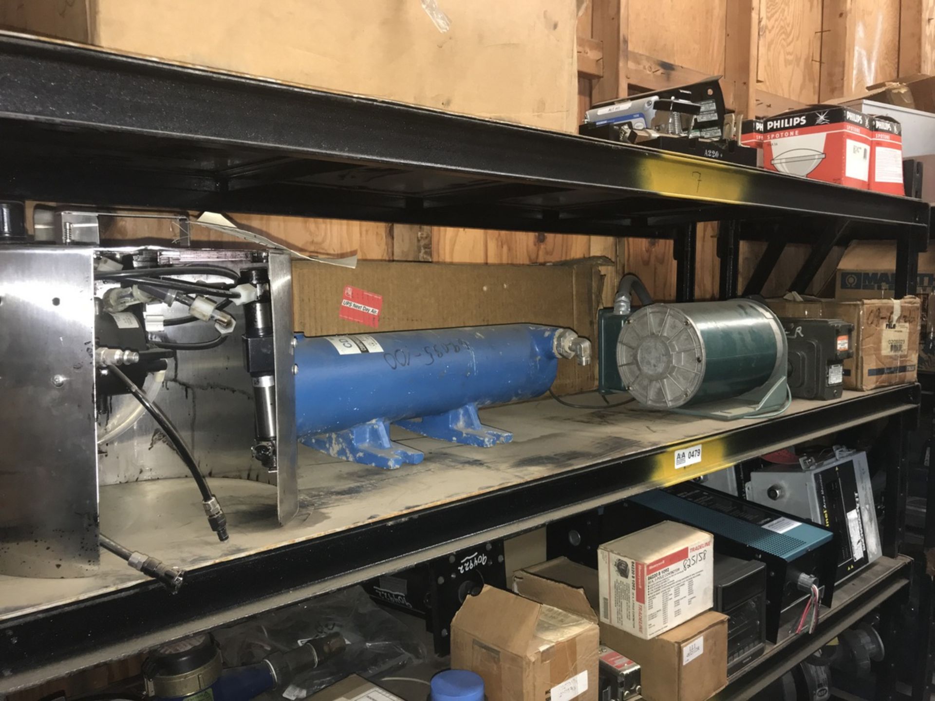 Contents of Shelf including Compressed Air Dryer Filter, Motors, Gear Reducers and Hubs