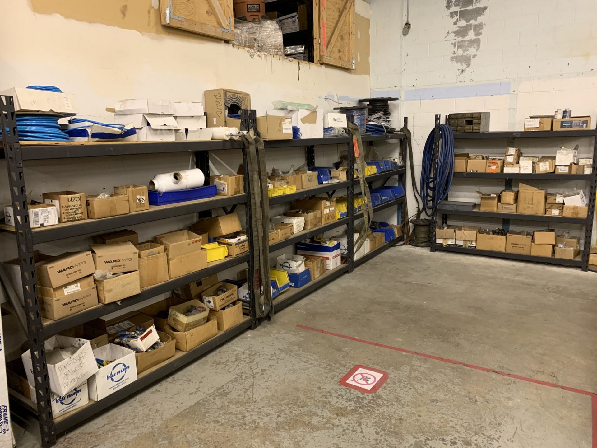 Contents of Shelving in Electrical and Plumbing Storage Area including Disconnects, Pipe Fittings,