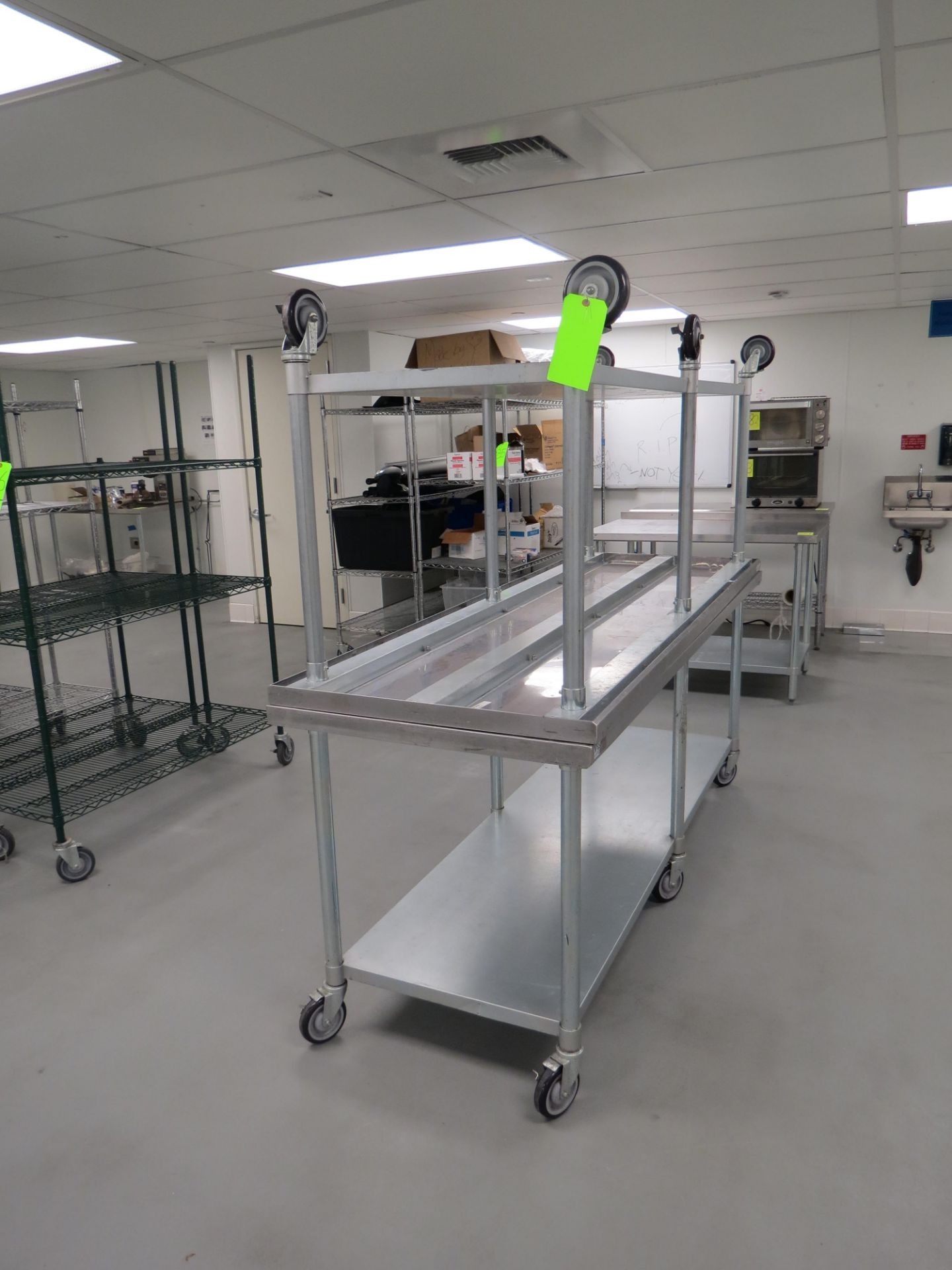 LARGE STAINLESS STEEL MOBILE PREP TABLE