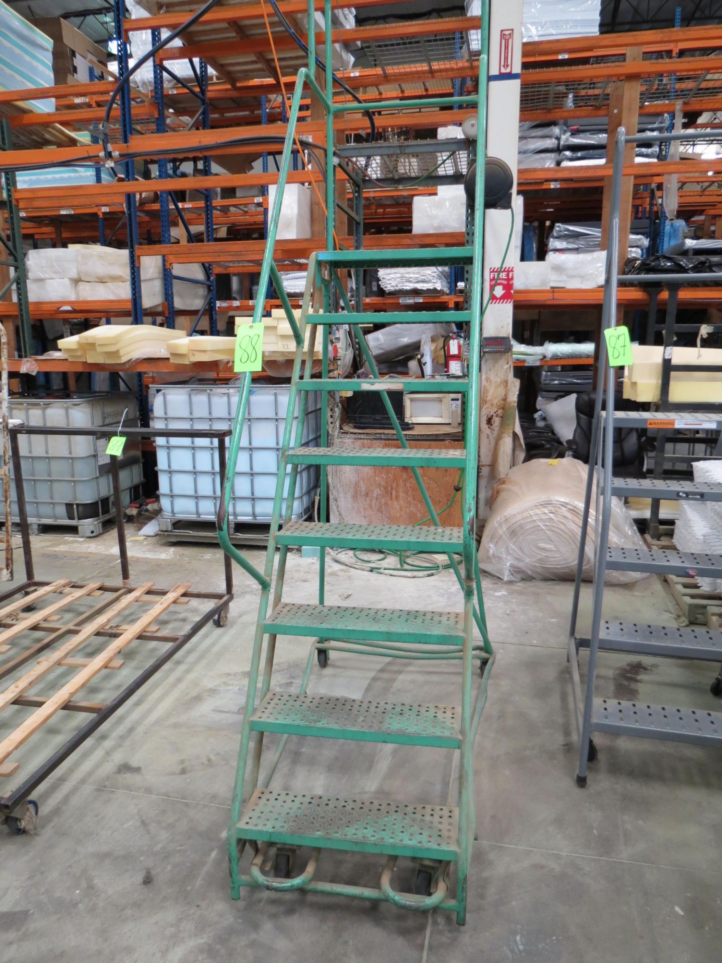 Green 8-Step Mobile Warehouse Ladder