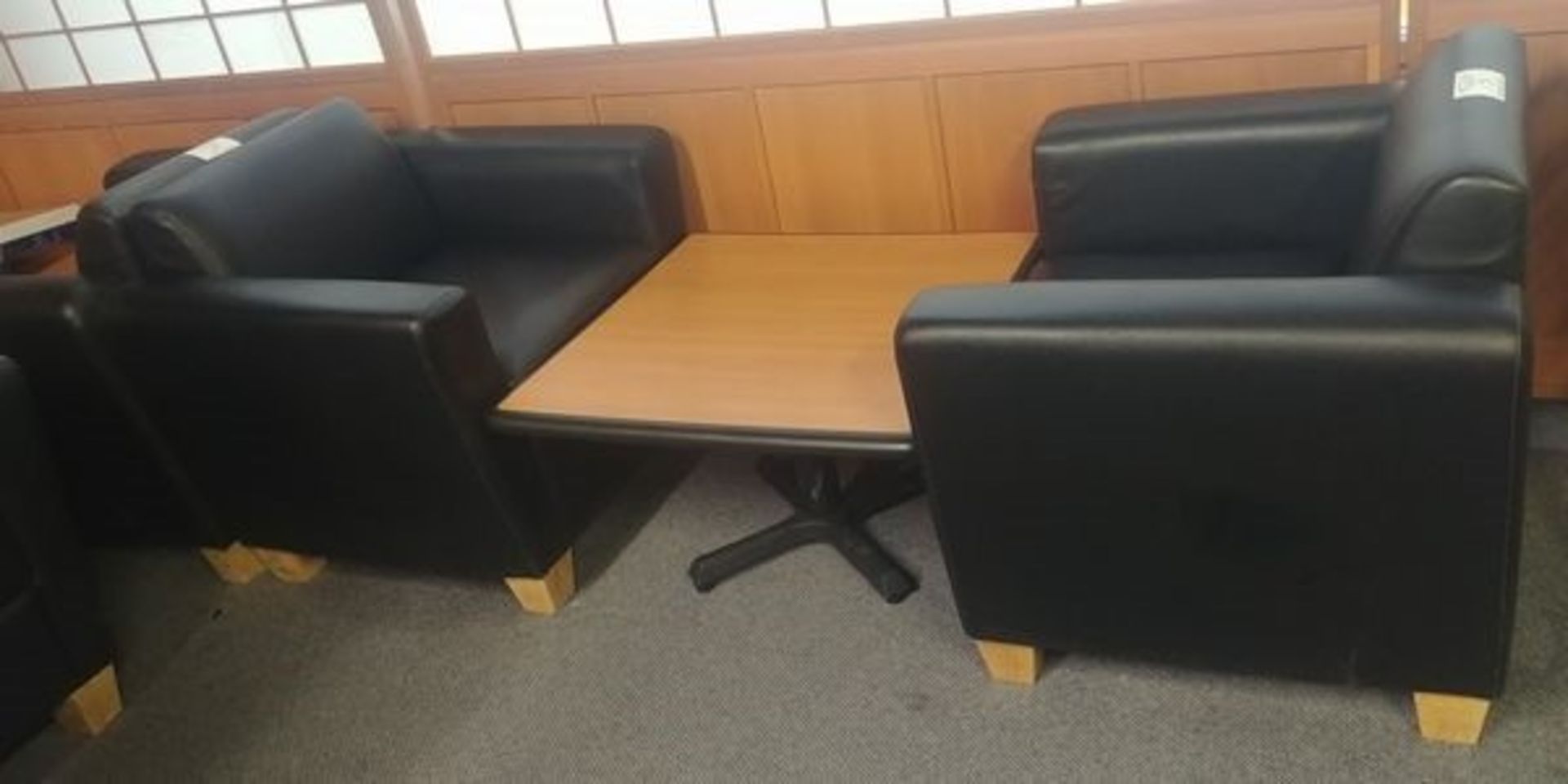 2 Black Sofa Chairs and Table