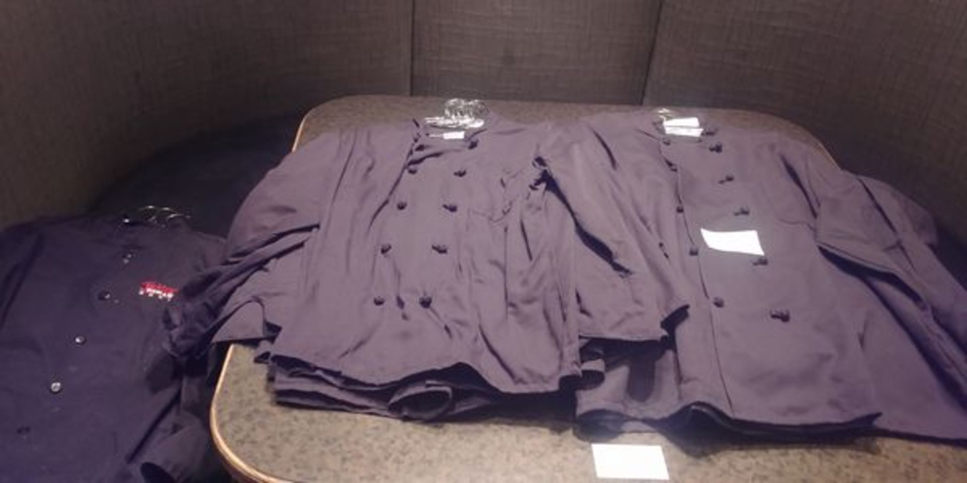 Table Lot of Black Chef Jackets