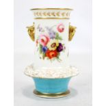 NANTGARW; a floral painted vase with gilt heightened moulded handles decorated as birds beaks,