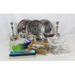 A quantity of electroplated items to include circular trays, a rectangular footed dish, a teapot,