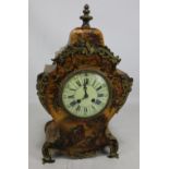A French giltwood and gilt metal mounted mantel clock,