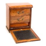 A mid-Victorian figured walnut travelling cabinet,