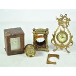 A brass carriage clock, the rectangular face with circular chapter ring set with Roman numerals,