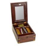 A 19th century teak and brass bound gentleman's travelling box,