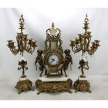 A gilt metal mounted three piece mantel clock garniture,
