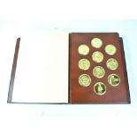 A Franklin Mint 'The Art Treasures of Ancient Greece' gold plated bronze medals,