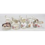 Ten Coalport floral painted jugs of various sizes, the tallest height 15.5cm (10).