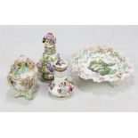 A Coalport floral encrusted and floral painted shallow bowl raised on three scrolling supports,