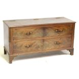 The lower section of a mahogany chest of drawers converted to a blanket box raised on bracket feet,