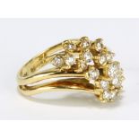 An 18ct yellow gold and white stone cluster ring,