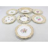 Seven Coalport floral painted cabinet plates and dishes (including one teapot stand),