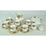 A Royal Albert 'Old Country Roses' pattern tea service comprising teapot, six trios, a cream jug,