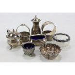 A group of variously hallmarked silver cruet pieces to include a baluster pepper,