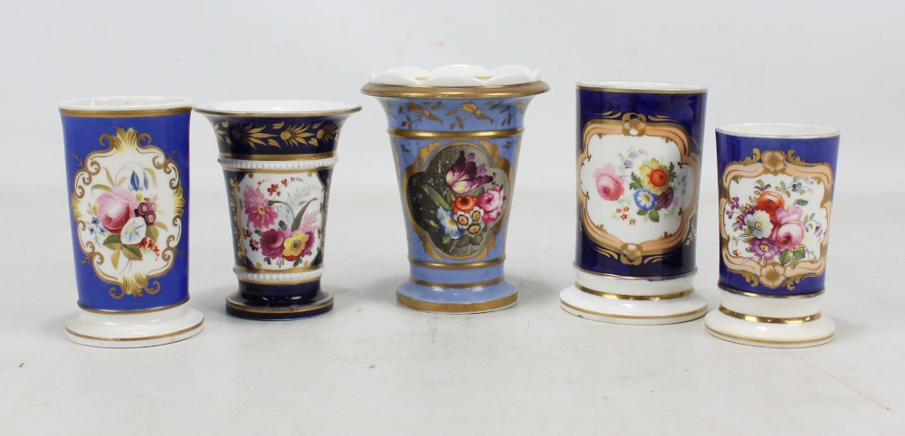 Five Coalport floral painted spill vases, each with blue ground gilt heightened main body,