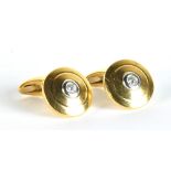 BOODLE & DUNTHORNE; a pair of 18ct yellow gold, white gold and diamond set cufflinks of target form,