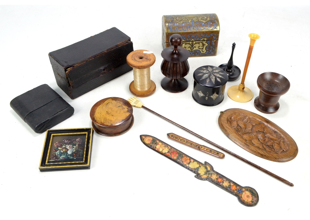 A 19th century brass dome topped casket, a black lacquered lidded box and cover, a treen ring stand,