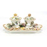 A Coalport floral encrusted inkstandish with twin lidded pots and scallop moulded handles to the