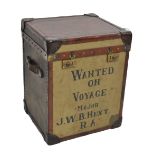 A canvas and leather travelling trunk, inscribed 'Wanted on voyage, Major JWB Hext RA', width 51cm.