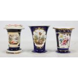 Three Coalport spill vases, two decorated with floral sprays,