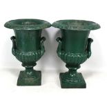 A pair of green painted iron garden urns, height of each 44cm (2).