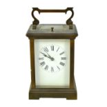 A late 19th century French brass repeating carriage clock,