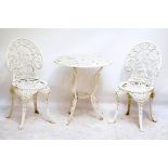 A white painted cast iron table and a set of four chairs (5).