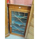 A late George III oak and mahogany banded flat fronted glazed corner cupboard, height 119cm.